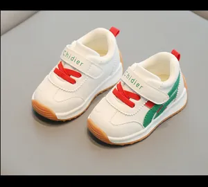 Scarpe da camminata per bambini in pelle bianca con suole morbide antiscivolo e lacci rossi