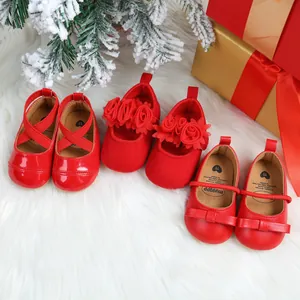 Collection of festive red baby princess shoes with flowers, bows, and patent finish