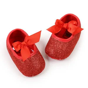 Red glitter baby princess shoes with a satin bow and a soft sole for infants' comfort