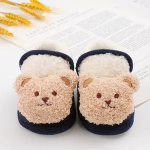 Close-up of cute teddy bear baby walking shoes with warm sherpa fleece lining