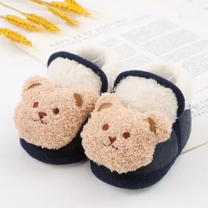 Macro detail of cute teddy bear baby walking shoes with soft warm fleece lining
