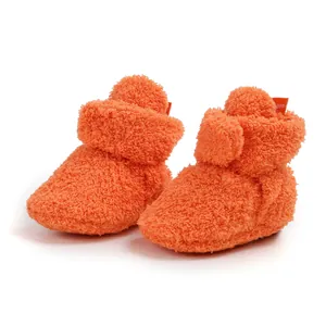 Scarpine invernali in peluche arancione per neonati e primi passi