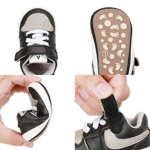 Close-up detail showing the soft rubber sole and velcro closure of baby walking sneakers
