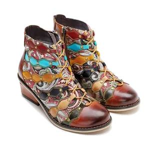 Vintage patchwork leather ankle boots with colorful paisley pattern and stud details