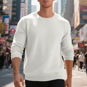 Detail of white men's long-sleeve sweatshirt with small waffle grid textured knit pattern