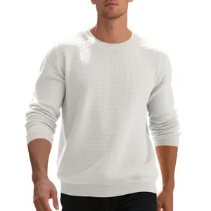 Detail showing the white waffle knit texture of a men's crewneck sweatshirt relaxed fit