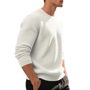 Close-up of men's white waffle knit long-sleeve sweatshirt with a relaxed crewneck fit