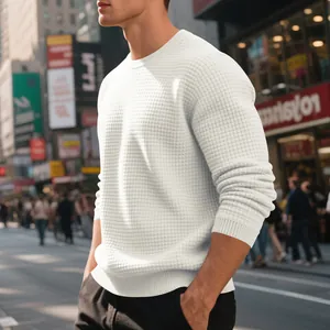Detailed view of white waffle knit crewneck sweatshirt for men in urban setting