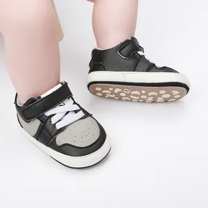Detail of baby indoor walking shoes with non-slip rubber soles and velcro straps