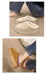 Detalle de zuecos con plataforma, forro de pelo sintético y bordado de colores