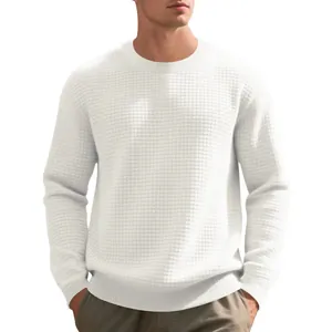 Detail showing the white waffle knit texture on a comfortable crewneck long sleeve sweater