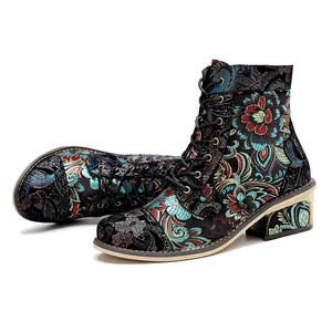 Detailed view of vintage Chinese style floral embroidery on these women's ankle boots