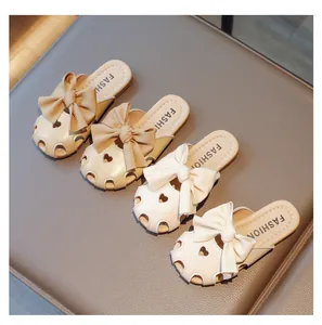 Elegant children's bow-knot summer sandals shown in off-white and beige colors