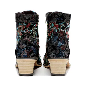 Macro back view of vintage Chinese style floral embroidered ankle boots with chunky heel