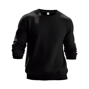 Detailed view of the black waffle-textured fabric on a men's casual long-sleeved crewneck top