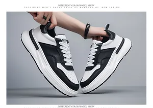 Primo piano di scarpe casual da uomo in pelle bianca e nera con elegante design panda