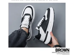 Vista dettagliata di eleganti scarpe da skate panda in pelle bianca e nera da uomo