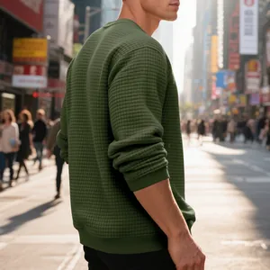 Detailed view of dark green waffle texture sweatshirt for men in casual urban style