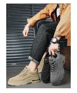 Vista detallada de botas de trabajo informales para hombre en color caqui, negro y gris