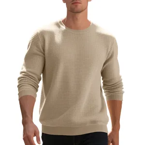 Detailed view of men's beige waffle knit crew neck long sleeve sweatshirt with textured fabric