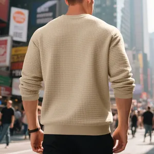 Detailed back view of men's beige sweatshirt featuring a textured small grid jacquard fabric