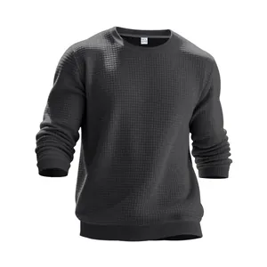 Macro detail of the waffle knit texture on a gray crew neck long sleeve sweatshirt