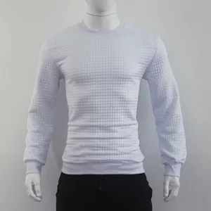 Front view of white long sleeve sweatshirt with jacquard waffle pattern on mannequin.