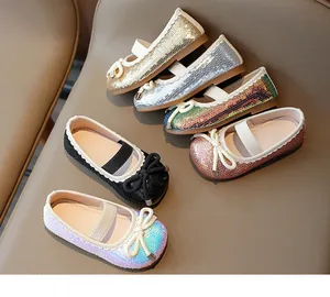 Variety of sparkly sequined girl's Mary Jane shoes with bow and elastic strap