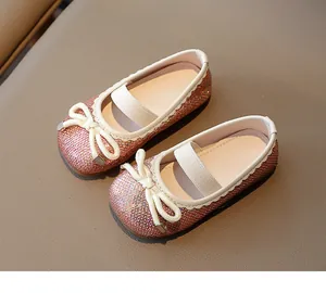 Girls' sparkly pink sequin princess shoes with cream bow and comfortable elastic strap