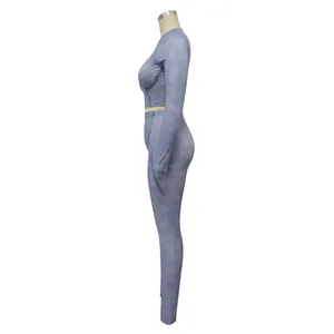 Side profile of two-piece ribbed sports set with long sleeve top and leggings.