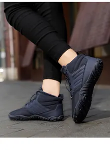 Blue mid-top outdoor hiking boots with warm fleece lining and sturdy rubber sole