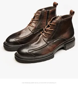 Detailansicht brauner Vintage-Leder-Schnürstiefeletten mit seitlichem Reißverschluss.
