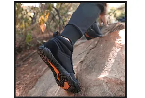 Macro view of non-slip sole texture on men's winter outdoor thermal hiking boots