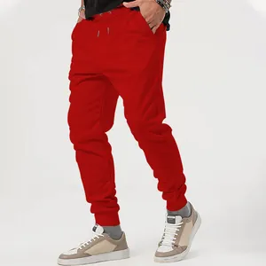 Men's bright red casual joggers with drawstring waist and ribbed cuffs for autumn sports