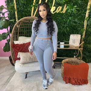 Close-up detail of a grey ribbed long sleeve crop top and matching leggings set