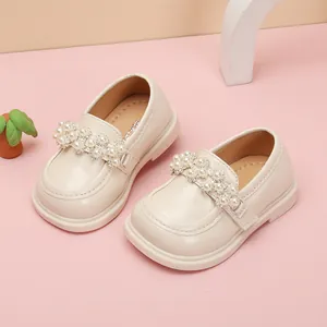 Elegant off-white baby girl princess shoes featuring pearl and rhinestone decoration