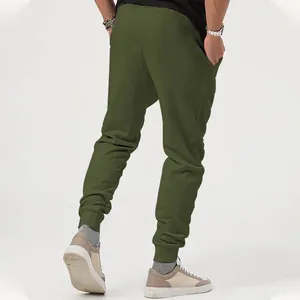 Detailed back view of men's olive green casual jogger pants featuring tapered elastic cuffs