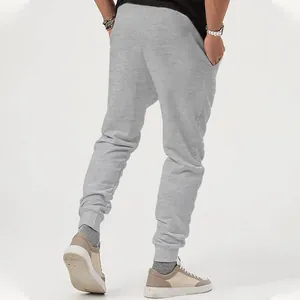 Back view of grey men's casual joggers showing high-quality fabric texture and ribbed ankle cuffs.