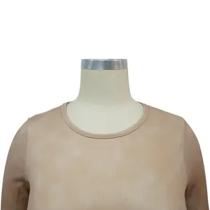 Detailed view of the beige ribbed long sleeve top on mannequin showing fabric texture