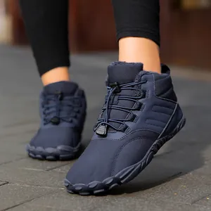 Navy blue mid-top winter hiking boots with warm fleece lining and toggle laces