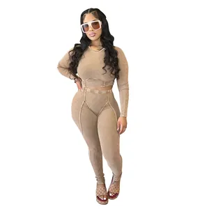 Stylish women's two-piece ribbed lounge set with long sleeve crop top and matching leggings