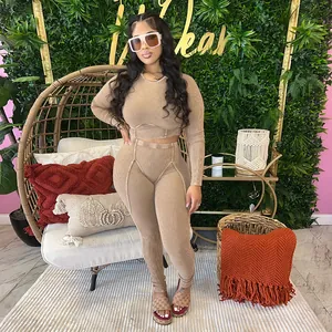Chic tan ribbed long sleeve two-piece loungewear and leggings set shown on model in studio