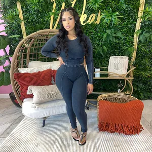 Detail of women's ribbed long-sleeve crop top and leggings two-piece set in charcoal
