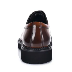 Rear view of premium brown glossy patent leather men's business casual dress shoe