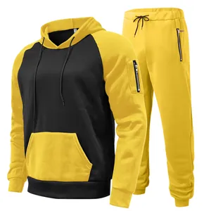 Detailed shot of men's color-block fleece tracksuit with hooded sweatshirt and pants