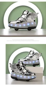 Detail of silver metallic kids roller shoes with wings and LED light-up soles