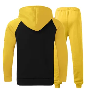 Back view of men's two-piece color block tracksuit with yellow fleece hoodie and pants