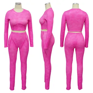 Detailed multi-view of pink ribbed long-sleeve crop top and leggings workout set