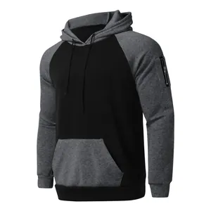 Detail view of contrast color men's fleece hoodie with a functional sleeve zipper