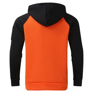 Back view of a two-tone orange and black fleece hoodie for men with raglan sleeves